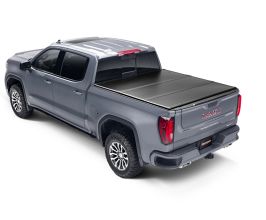 Undercover 05-21 Nissan Frontier 5ft w/ Factory Cargo Management System Triad Bed Cover for Nissan Frontier D40