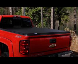 Lund 04-15 Nissan Titan (5.5ft. Bed) Hard Fold Tonneau Cover w/Bracket Kit - Black for Nissan Titan A60