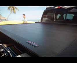 Roll-N-Lock 07-17 Toyota Tundra Crew Max Cab 65in E-Series Retractable Tonneau Cover for Toyota Tundra XK50